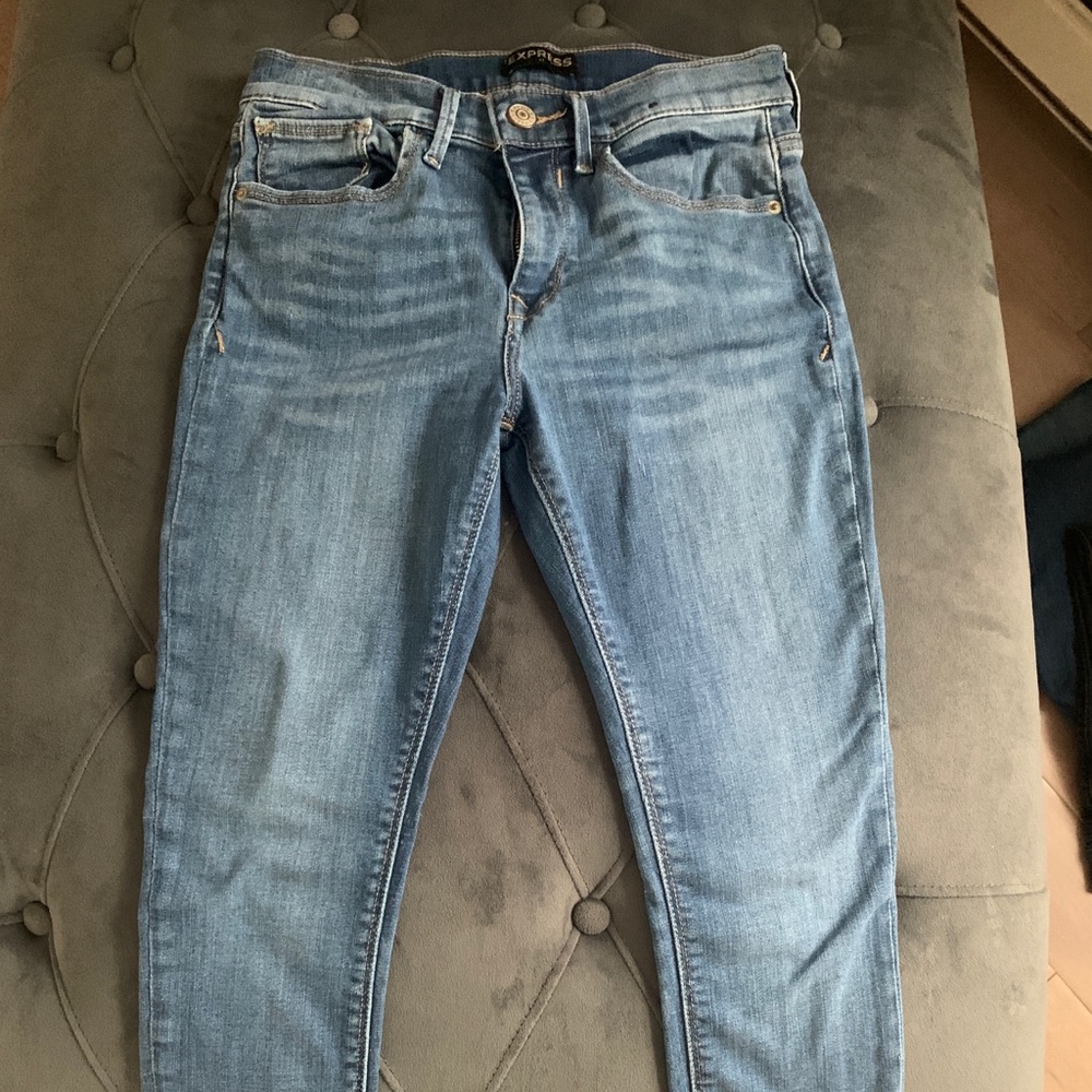 Express light wash skinny jeans